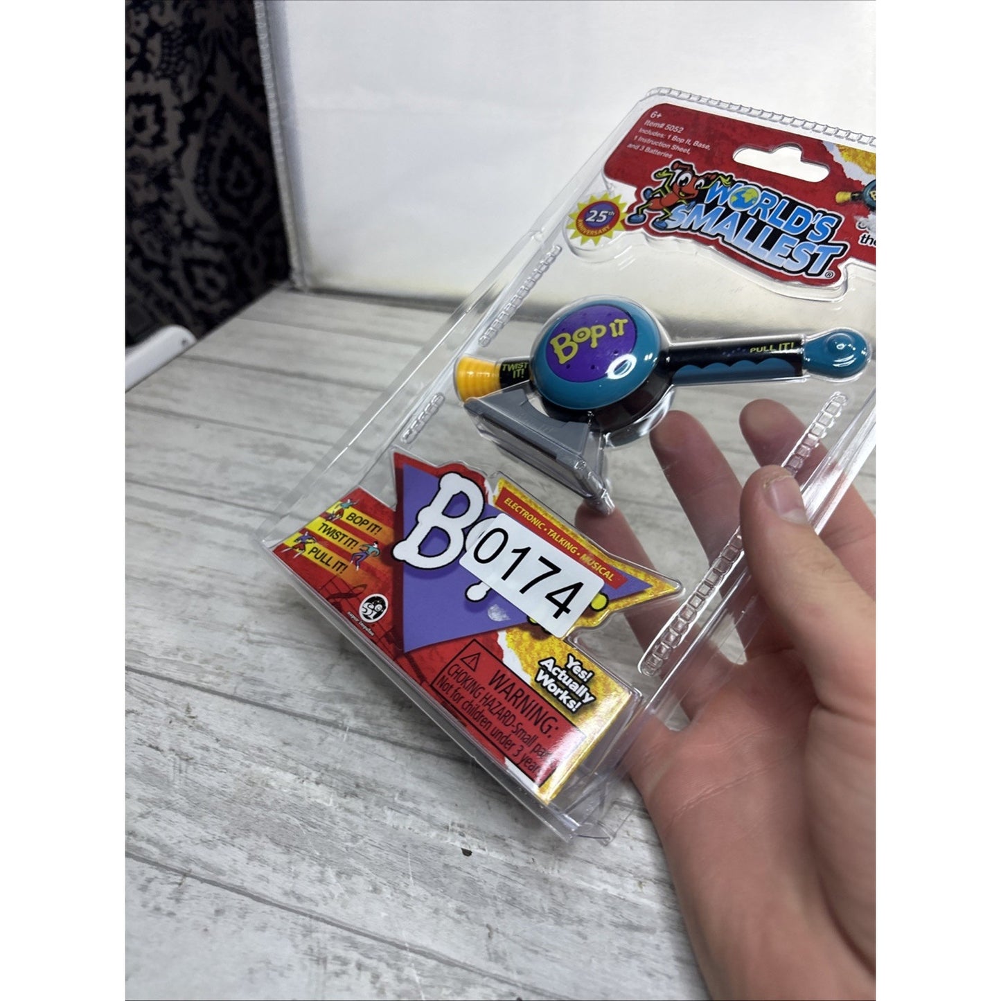 Worlds Smallest Bop It 2025 Twist It Pull It 25 th Anniversary Item # 5052